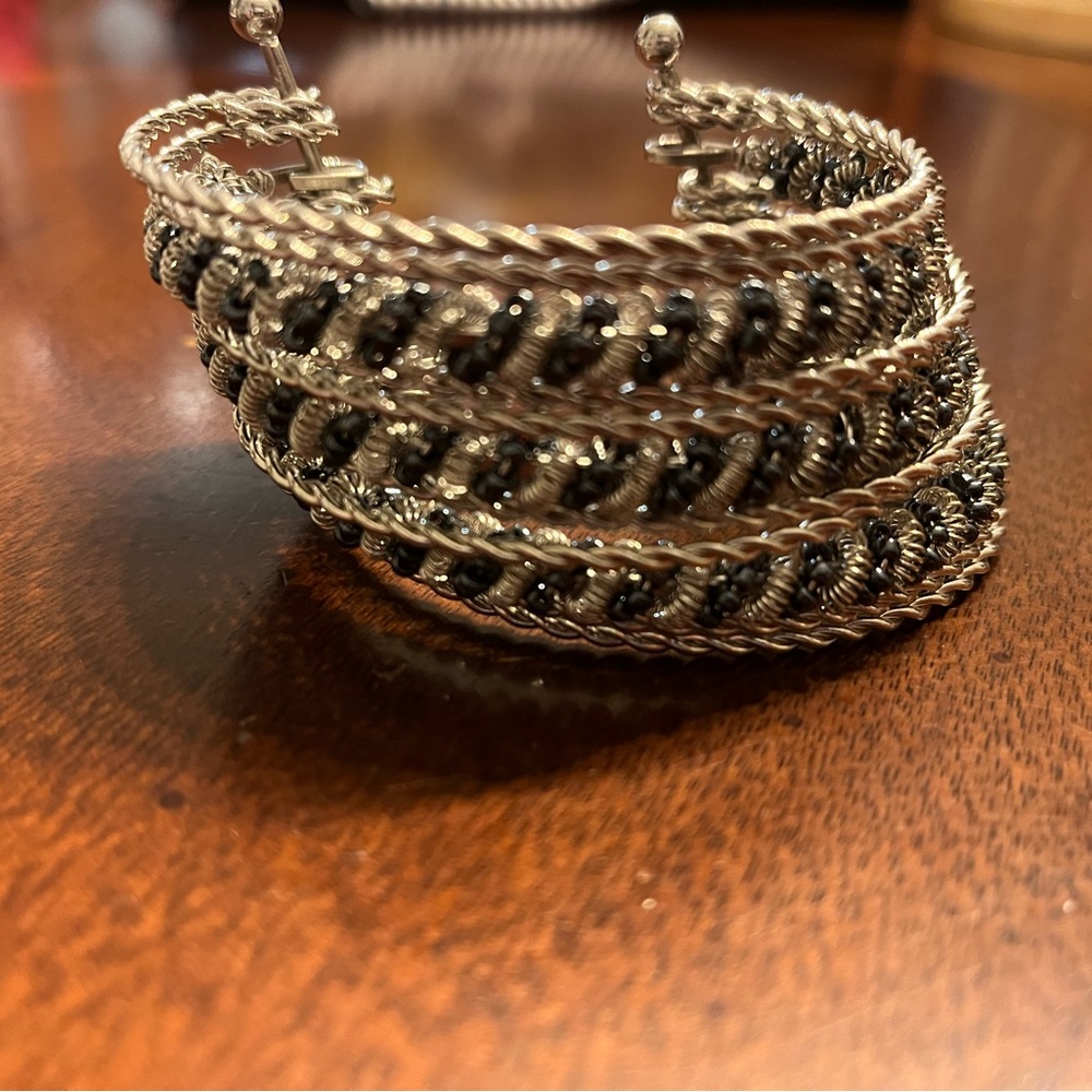 Silver cuff bracelet with black accents